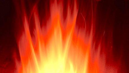 Close-up of flame that is yellow at the center and orange and red as it radiates outward