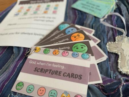 Scripture cards with emoji faces making different expressions.