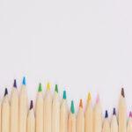 Colored pencils of different colors and lengths.