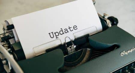 Close-up of the word "Update" on a sheet of paper in a typewriter