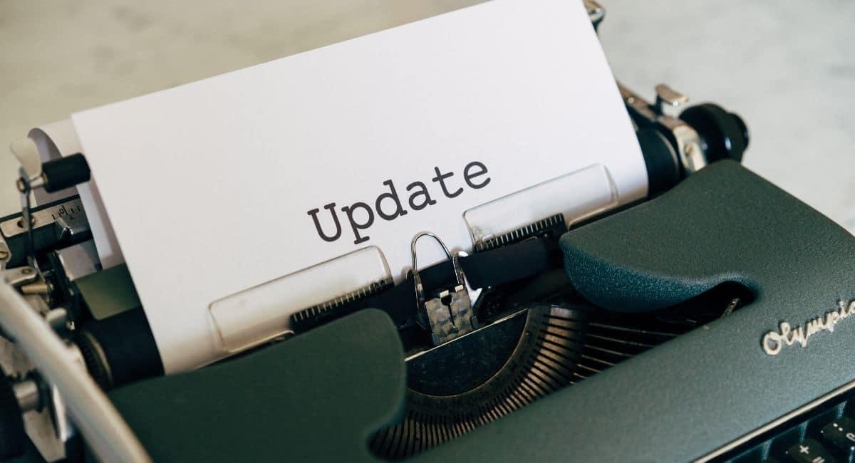 Close-up of the word "Update" on a sheet of paper in a typewriter