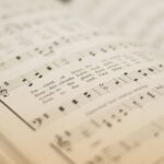 Close-up of a page printed with the music of the hymn "O Worship the King"