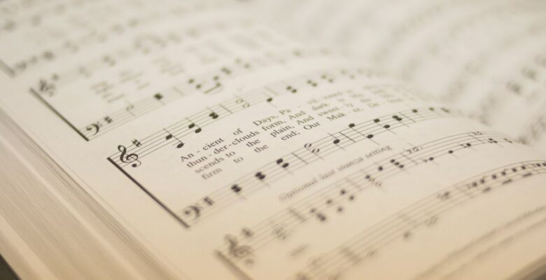 Close-up of a page printed with the music of the hymn "O Worship the King"