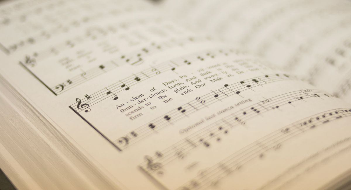 Close-up of a page printed with the music of the hymn "O Worship the King"